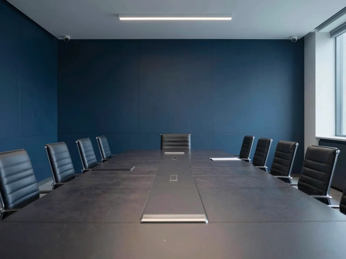 Crisp architectural interior shot of a modern boardroom with a la